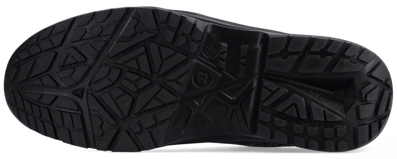 The image shows the underside of a sports shoe. It is black with a pronounced tread featuring various jagged and diamond-shaped patterns, which ensure good traction.