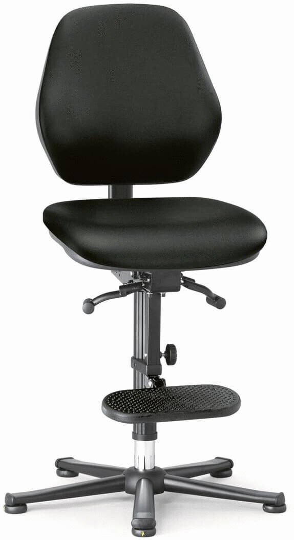 The chair is black, has a padded seat, and a high backrest. Under the seat, there is a footrest. The legs are sturdy and have casters.