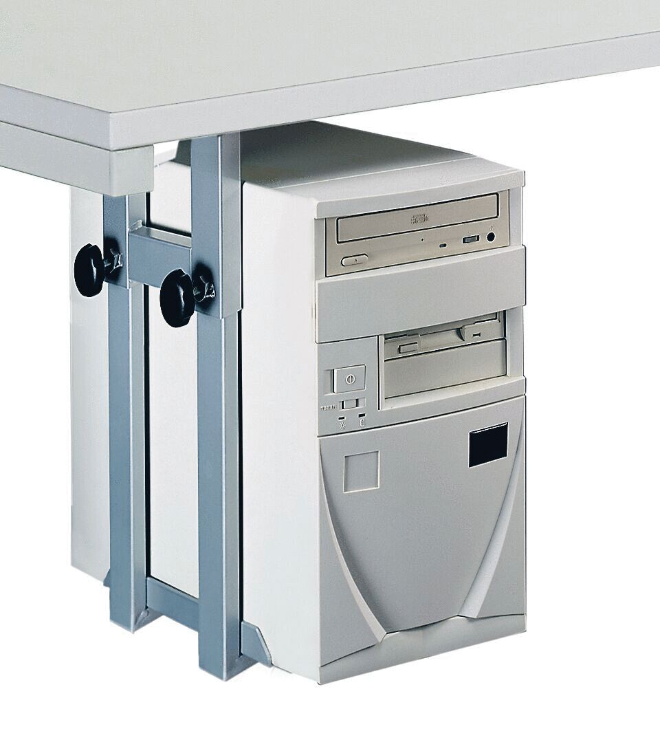 The image shows a computer mounted under a table. It has a white case color with several drive bays and is secured by a silver bracket.