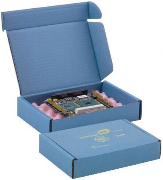 The image shows a blue package that is open and contains a circuit board. The board is placed on soft, pink foam and is securely packaged. Next to the open box lies another closed box.