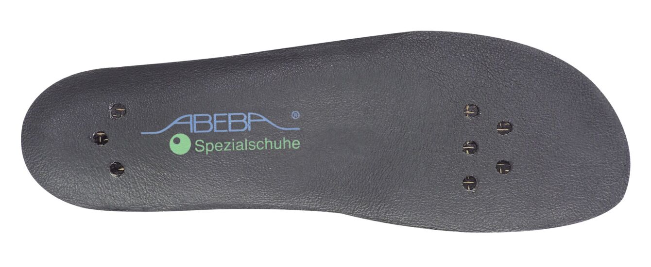 The image shows a black insole with several holes for ventilation or attachment. On the insole, in blue letters, it reads "ABEBA" and below that, in green letters, "Special Shoes".