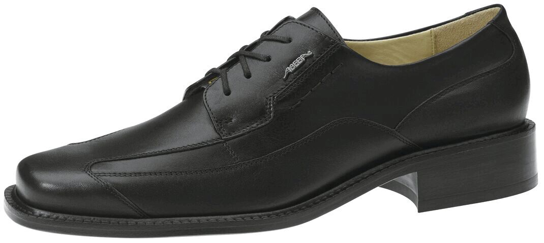 The image shows an elegant, black leather shoe with a flat sole and minimal heel. It has a slim shape and laces, ideal for formal occasions.