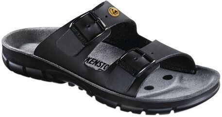 The image shows a black slide sandal with two adjustable straps and a thick, non-slip sole. The shoe is comfortable and well suited for relaxed leisure activities.