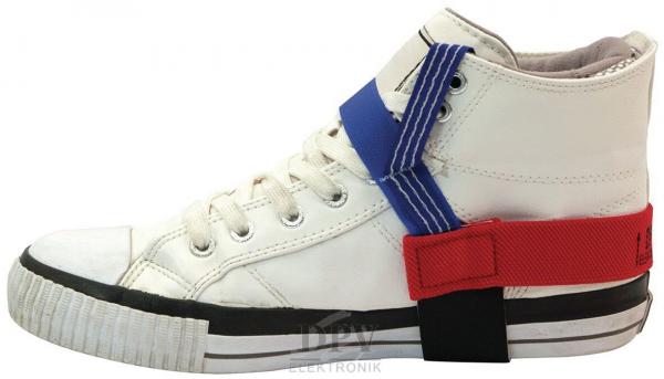 The image shows a white high-top sneaker. It has a black sole and three colored bands: red, blue, and black, wrapped around the shoe.