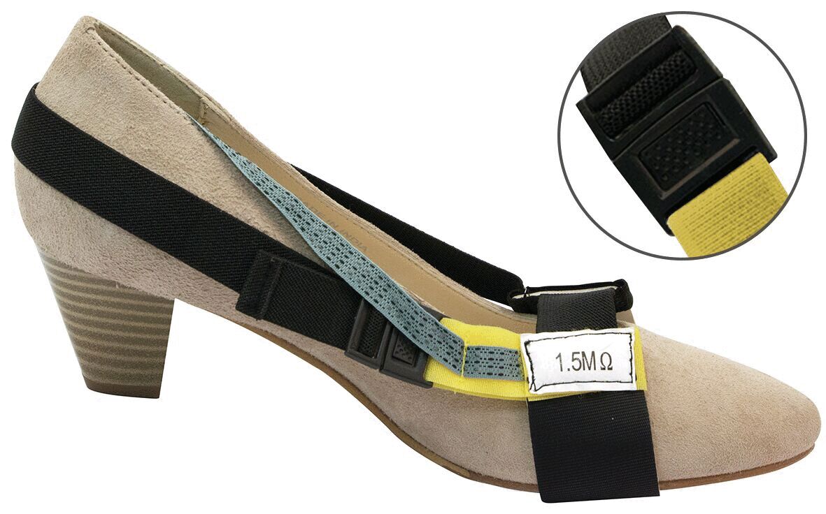 The image shows a tall, beige heeled shoe. Attached to it are various straps and a cable, marked with a "1.5".